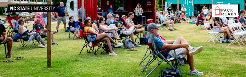 Snapshot of people attending outdoor concert on NC State's Centennial campus.